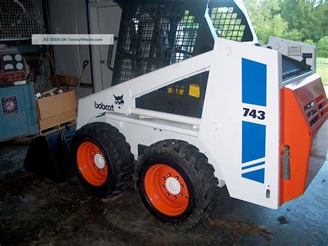 743 skid steer controls|743 skid steer attachment control.